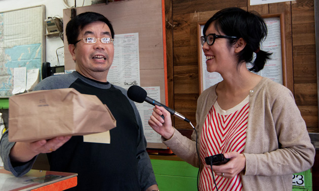 Val Wang interviews John Chan at Yum Yum Chinese takeout on Dot Avenue in Boston. Source: Kelly Creedon / WGBH